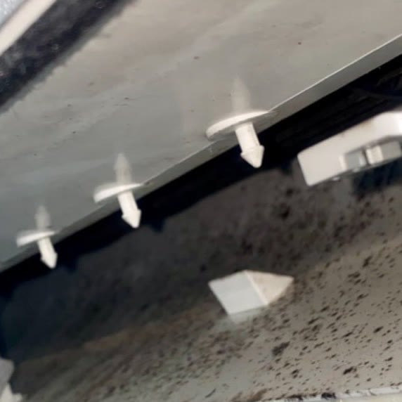 Inside a Gold Coast split system before cleaning, showing heavy mould speckling