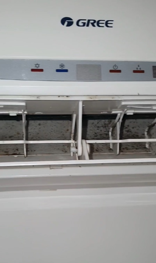 Melissa M.'s Gree split system photographed by the customer, before